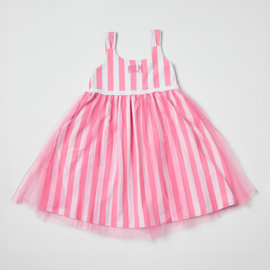 Sustainable kids pink and white striped dress with a tulle skirt on a light gray background