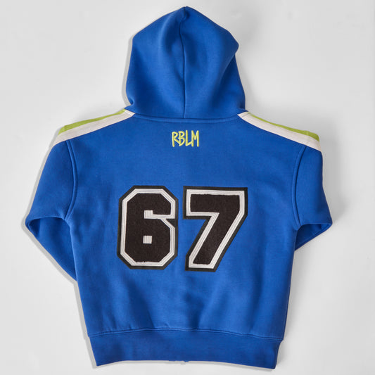 A sustainable and comfortable bright blue hoodie for children shown from the back, featuring the number 67 ("SIX SEVEN!") in black and white varsity lettering, and 'RBLM' printed in neon green near the neck. The hoodie has white and green stripes on the shoulders and is laid flat on a light gray background.