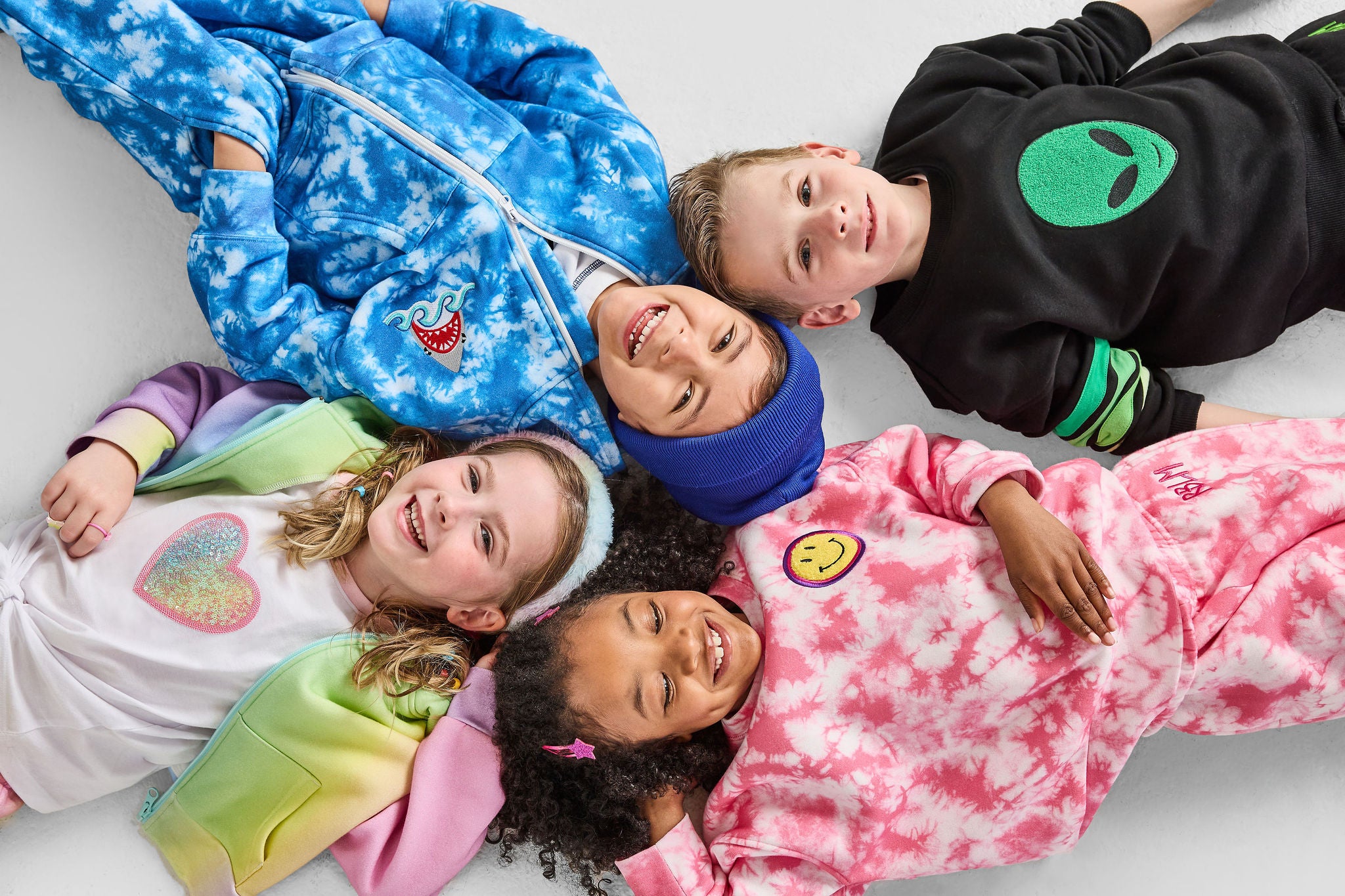 group of kids wearing our sustainable children's clothing