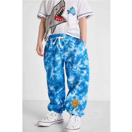 close up of our sustainable ocean tie-dye joggers and shark crewneck t-shirt