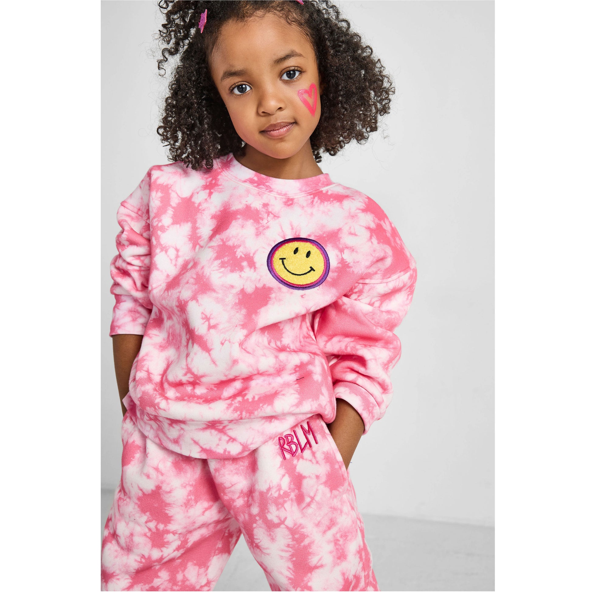 girl wearing our sustainable Smiley Tie-Dye Set