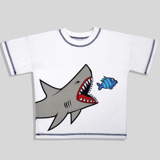 A sustainable and comfortable white short-sleeve ringer T-shirt with blue contrast stitching, featuring a graphic print of a gray shark with its mouth open about to eat a blue striped fish, set against a solid gray background.