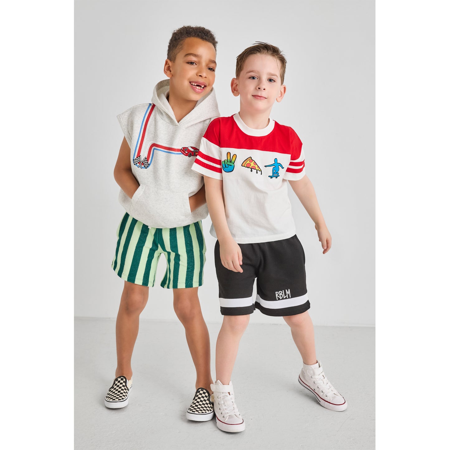 Boys wearing fun, colorful, cool, and sustainable outfits.