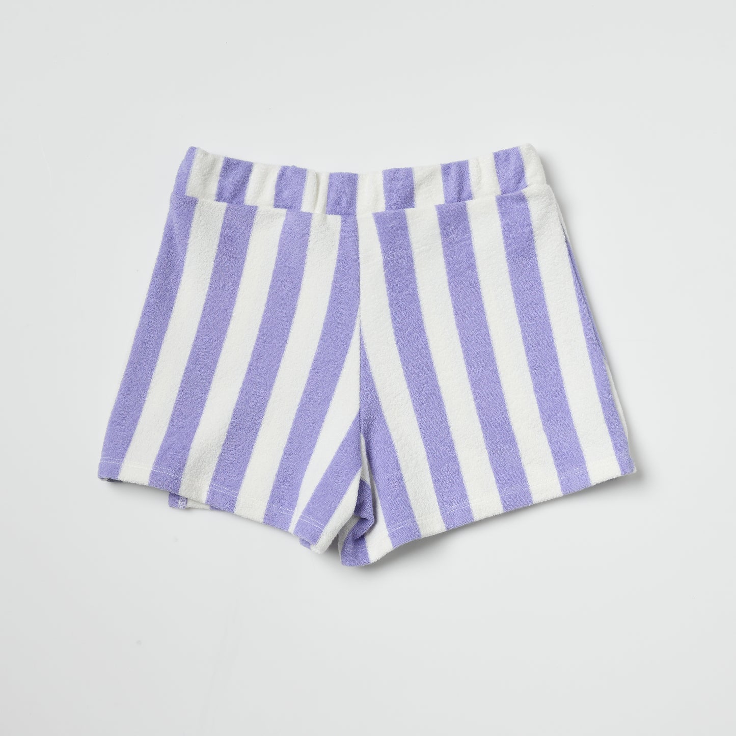 Back of sustainable kids purple and white striped skort on a light gray background