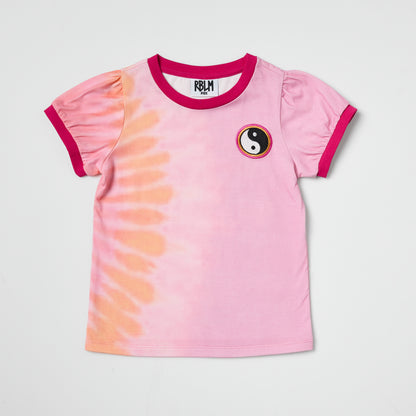 Sustainable kids pink tie-dye t-shirt with yin yang embroidery on a light gray background